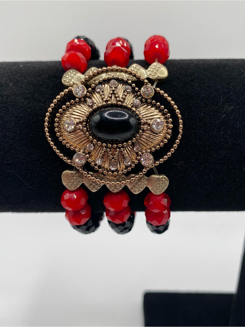 Elegant Red and Black Beaded Statement Bracelet - Gold Accent